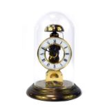 A 20thC brass skeleton clock, the circular enamel dial bearing Roman numerals, eight day movement, i