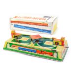 A Mid Century Russian tinplate wind-up train set, 24cm wide, boxed.