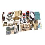 A collection of military cap badges, a Ninth Horse Nailers Corp badge, bleakay cap badges, stag and