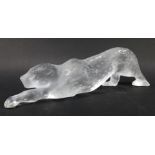 A Lalique glass sculpture, modelled as a prowling leopard, signed, 37cm long.