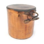 A 19thC copper stock pot and lid, 29cm high.