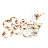 A Royal Albert Old Country Roses coffee service, comprising coffee pot, six coffee cups and saucers,