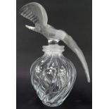 A Lalique glass L'Air du Temps perfume bottle, signed, 31cm high.