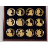 A set of twelve commemorative Elizabeth II Diamond Jubilee gold plated silver proof coins, issued by