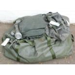 An Army filtration kit, water taps, pumps, 2500 Gallon water tank, etc. (1 bag)