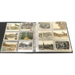 An early 20thC postcard album, comprising mainly seaside UK towns in black and white, in colour a la