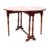 A 19thC mahogany drop leaf table, the top with a moulded edge on six turned legs, united by turned s