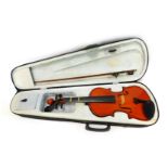 A modern two piece violin, 58cm long, together with a bow, in a fitted canvas case.