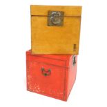 Two painted storage boxes, with ornate brass clasp, in red and yellow, 54cm high. (AF)