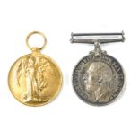 Two World War One medals, comprising a George V defence medal, inscribed SS7113 E Wallis ABRN, and a