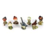 A group of Beswick pottery birds, comprising Chaffinch 991, Grey Wagtail 1041, Blue Tit 992, Wren 99