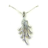 An 18ct white gold diamond pendant and chain, the spray design pendant set with arrangement of tiny