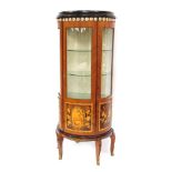 A 20thC Italian rosewood and walnut vitrine, the moulded ebonised top above a cast metal band decora