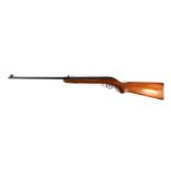 A UL air rifle, enscribed CC26201, with wooden stock, 107cm long.