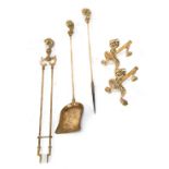 A 20thC brass fireside companion set, comprising poker, shovel, tongs, and pair of fire dogs, each h