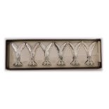 A cased set of six Arts de la Table place card settings, formed as two feathers, silver plated, boxe