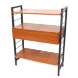 A Ladderax style shelving unit, comprising two shelves and a central drawer section, enclosing vario