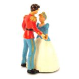 A tin plate wind up toy of Cinderella and Prince Charming, novelty mechanical waltzing figures, with