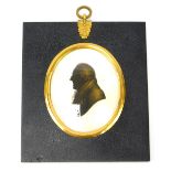 19thC School. Portrait silhouette of a gentleman, gilt heightened, paper label verso, George Parker