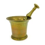 A 19thC brass pestle and mortar, the mortar 10cm high.