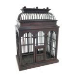 A 20thC wooden and wire work bird cage, 48cm high.