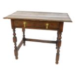 An 18thC oak side table, with moulded top, frieze drawer, and baluster turned legs, 73cm high, 97cm