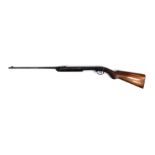 An air rifle, .22 calibre, bolt action, unmarked, with wooden stock, 108cm long.