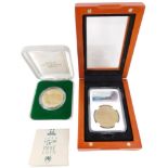 Two collectors coins, comprising a Royal Australian mint five dollar cased proof coin for 1988, and
