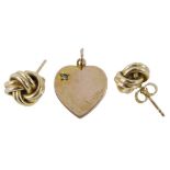 A pair of 9ct gold knot earrings, and a 9ct gold heart shaped pendant set with diamond and marked Ap