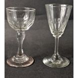 A 19thC cut liqueur glass, with plain bowl, baluster stem and domed foot, 11cm high, and another sma