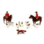 A Beswick ceramic part hunting set, to include two huntsman seated on brown horses, various hounds a