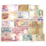 A collection of Middle Eastern banknotes, comprising Bangladesh, India, Qatar, and others. (a quanti