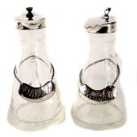 A pair of George V silver and cut glass toddy jugs, Birmingham 1925, each with a silver whisky decan