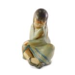 A Lladro matt glazed figure of The Eskimo Girl, with blue Lladro stamp to underside, 29cm high.