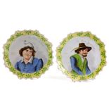 A pair of 19thC French faience Humorus cabinet plates, inscribed LE PERE HEUREUX and LE PERE YVETOT,