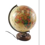 A Danish Scan-Globe with copyright 1993, and an oak Art Deco barometer and thermometer.