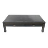 An Oriental ebonised pine rectangular coffee table, with two drawers to each side, 40cm high, 139cm