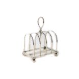 A silver plated four division toast rack.