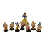 Disney Enchanting collection figures, comprising Fairest Of Them All Snow White figure and The Seven
