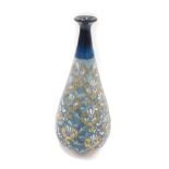 A Royal Doulton Lambeth stoneware vase, of conical form with a turquoise stem and gold, blue and whi