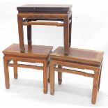 Three Chinese low tables, each with a carved frieze, on square tapering legs, 50cm high, 33cm wide a