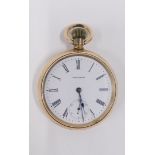 A Waltham gold plated pocket watch, with white enamel dial and bezel wind.