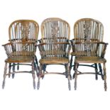 A set of six yew, ash and elm Windsor chairs, in early 19thC style, each with a tall hooped back pie