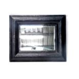 A pine framed rectangular wall mirror, with applied leatherette style black border, 94cm x 102cm. (A