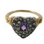 A heart shaped dress ring, pave set with diamonds and central amethyst, with scroll shoulders, yello