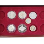 A group of collectors coins, comprising a two pound 2014 WWI 1914-18 commemorative coin, a commemora