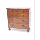 A Victorian mahogany bow fronted chest of drawers, the figured plain top above two short and three l