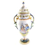A 19thC French faience HB Quimper lidded vase, with potpourri top in the Bretonne and Botanical patt