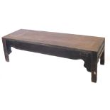 A Chinese low opium or coffee table, the frieze with recesses for drawers, on plain supports, 184cm