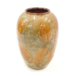 A Royal Doulton vase, on brown treacle glaze with leaf decoration, 17cm high.